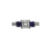 PLATINUM 1.08CT F VS1 CUSHION SET IN A PAST, PRESENT AND FUTURE MOUNTING WITH TWO ROUND LABORATORY GROWN ALEXANDRITES CERTIFIED BY GIA #5234160482 FOR CUSHION  AND GIA #2231160642 FOR ROUND ALEXANDRITES